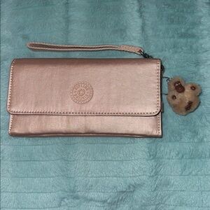 Kipling large wristlet wallet in metallic rose gold NWOT